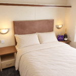 Warm Bedroom With Milk Tray And Bollinger
